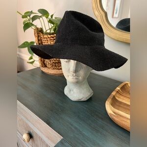 Anthropologie Raffia durable wide brimmed hat.